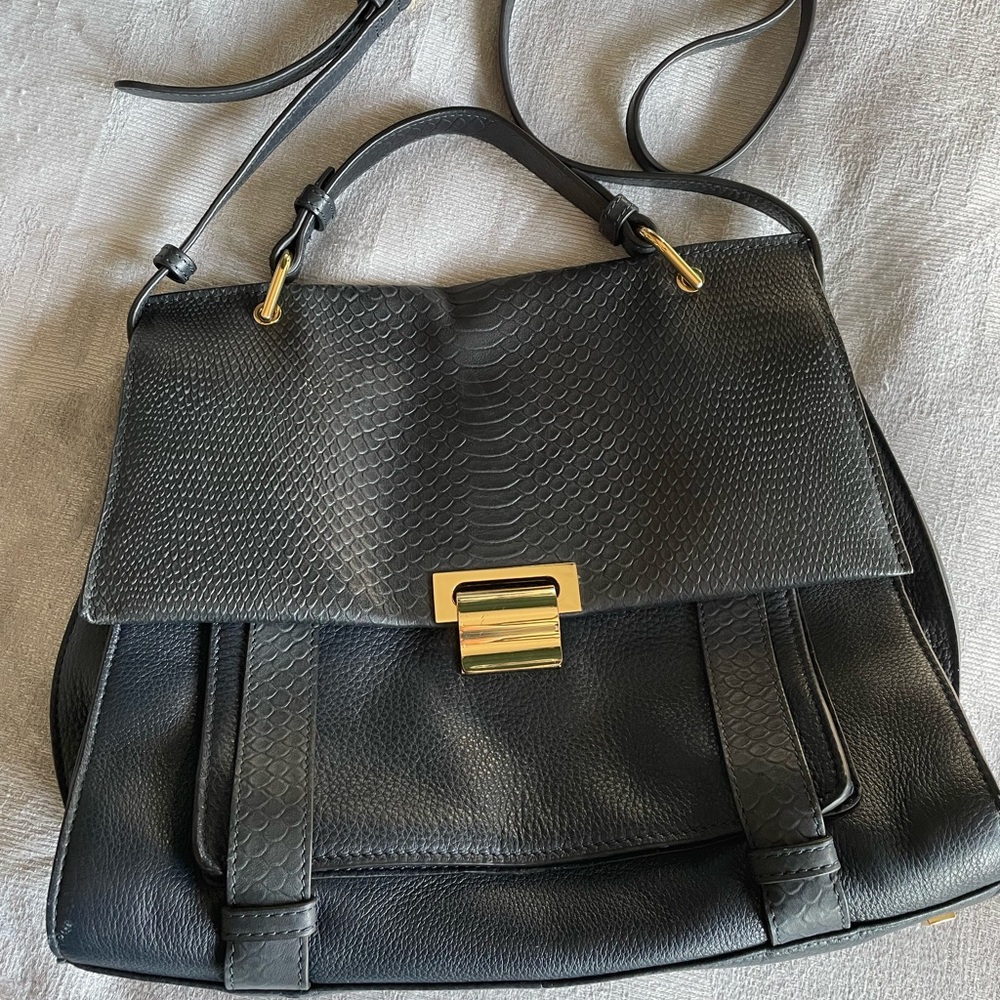 Crossover handled Ivanka Trump bag- politics aside she made beautiful purses